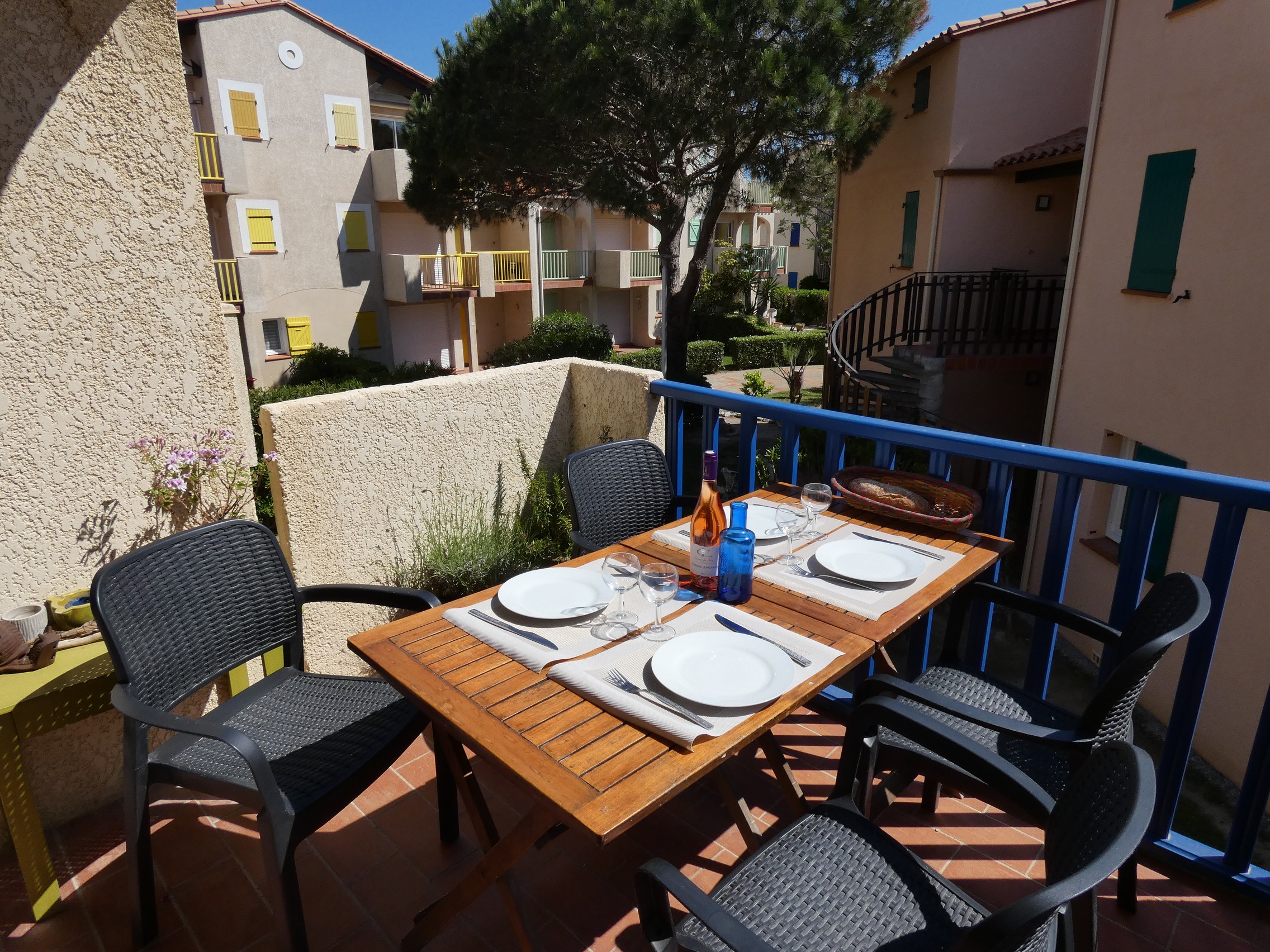 Balcony with tables and chairs